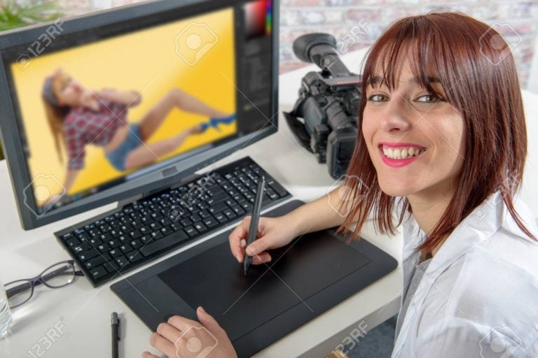 70075111 Young Female Designer Using Graphics Tablet For Video Editing 1